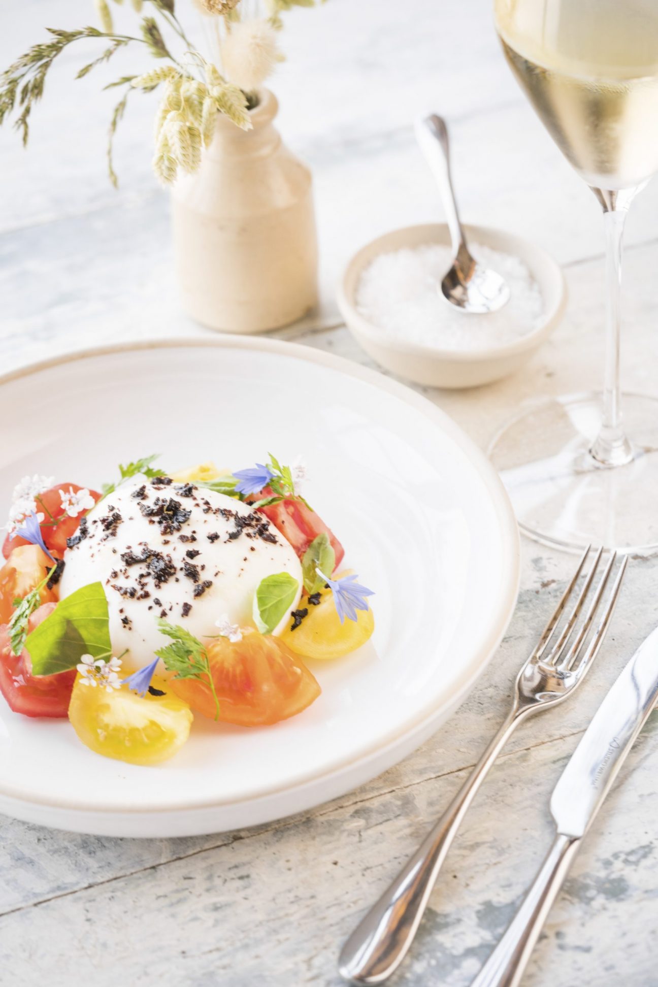 A light tomato and goat's cheese salad - best restaurant in Worthing, wine estate Sussex